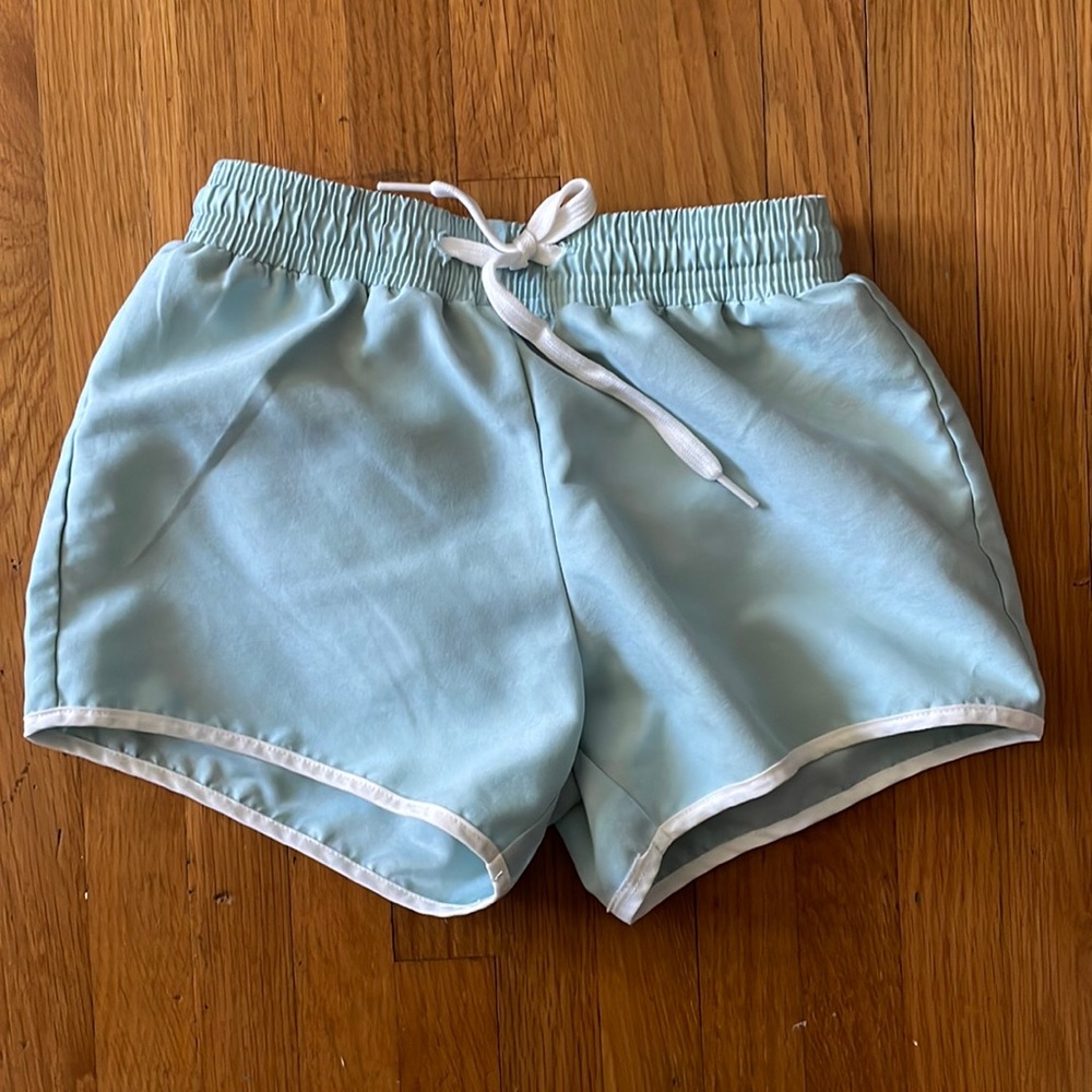 Mint green EUC swim trunks